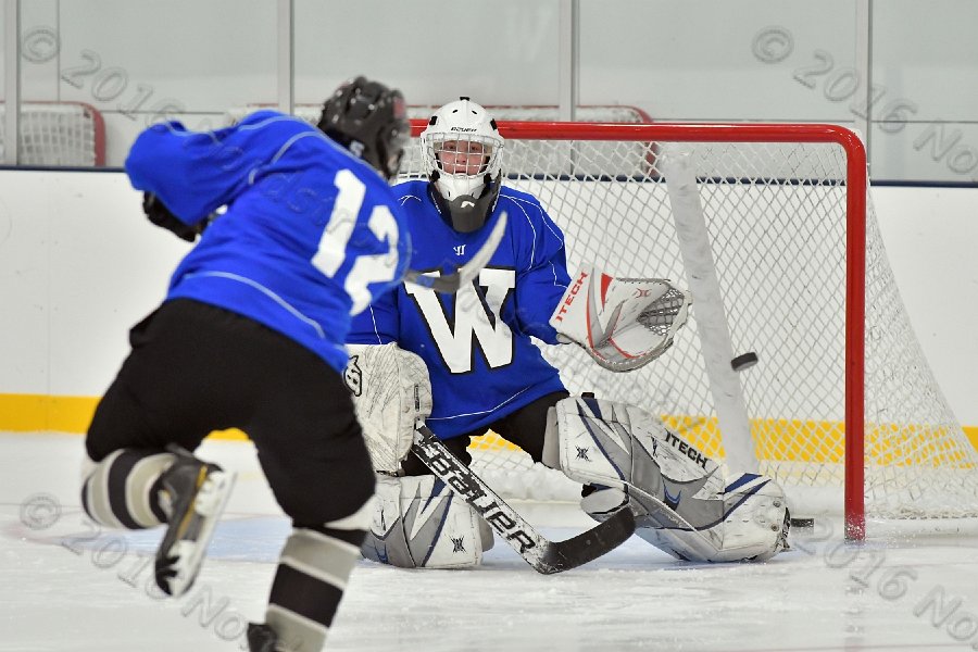 Wheaton College Men\'s Ice Hockey vs Middlesex Community College. - Photo By: KEITH NORDSTROM
